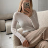 Modest winter blouse for hijabi women – beige knitted design with long sleeves – premium Turkish fabric – available at CATRIXA Belgium with fast EU delivery.