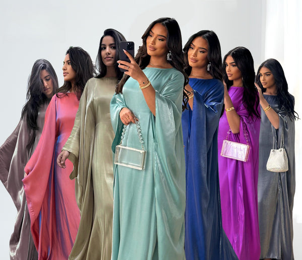 Glossy evening abaya for hijabi women – modest design in luxury colors (blue, gold, silver) – premium Turkish fabric – available at CATRIXA Belgium with fast EU delivery.