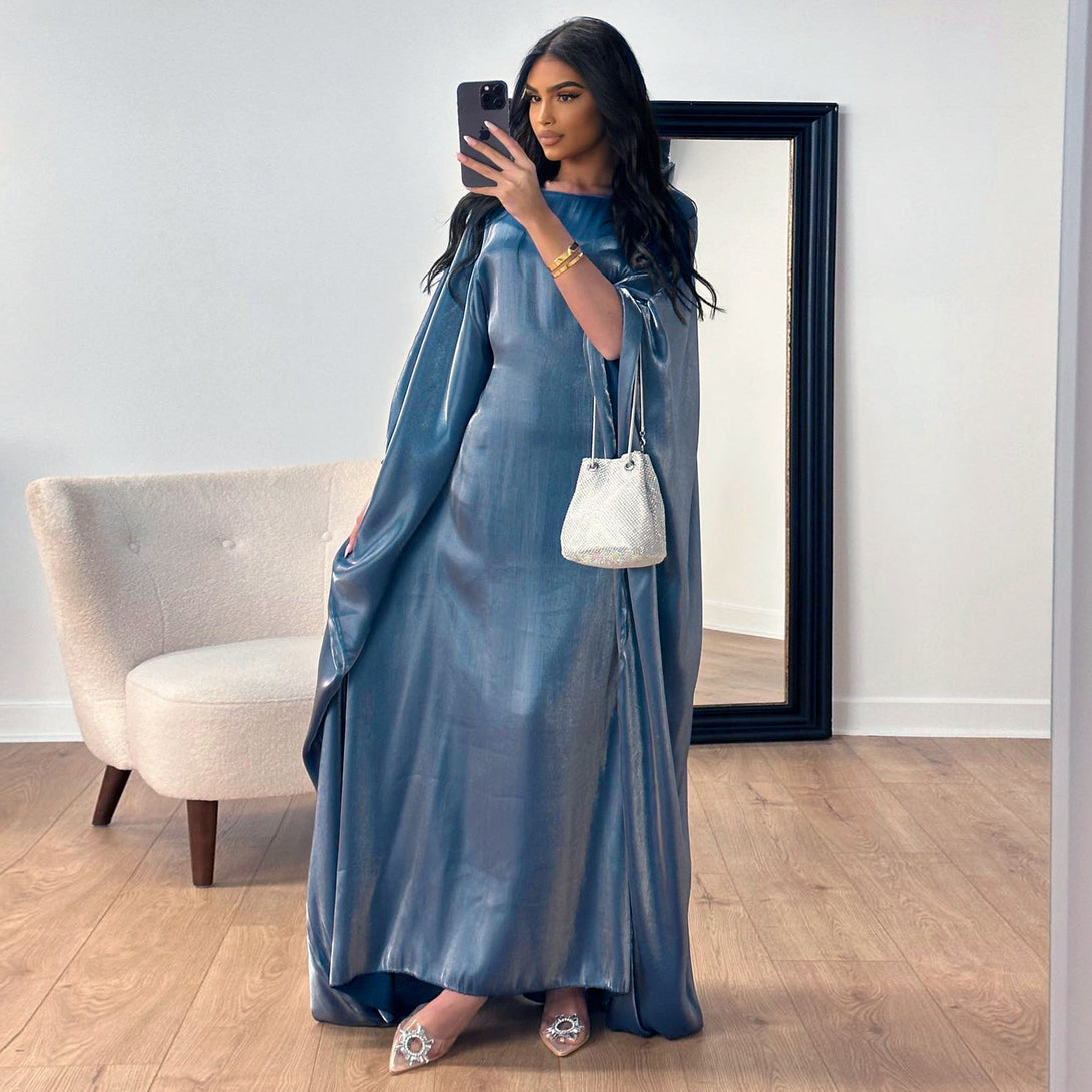 Glossy evening abaya for hijabi women – modest design in luxury colors (blue, gold, silver) – premium Turkish fabric – available at CATRIXA Belgium with fast EU delivery.