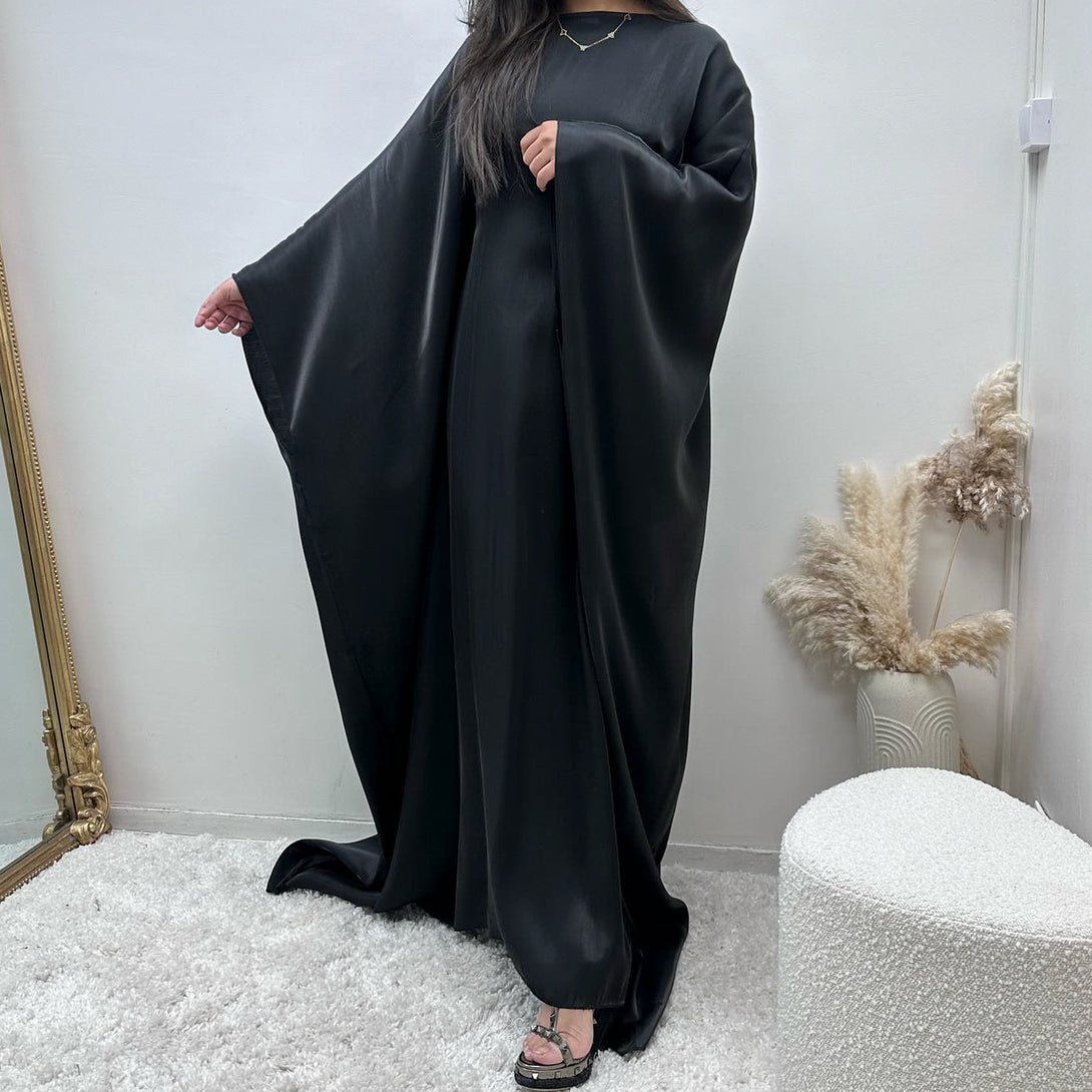 Glossy evening abaya for hijabi women – modest design in luxury colors (blue, gold, silver) – premium Turkish fabric – available at CATRIXA Belgium with fast EU delivery.