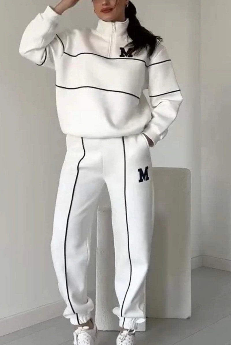 Black sportswear set with embroidered M – sweatshirt and loose pants for hijabi women in Europe – available at CATRIXA Belgium.